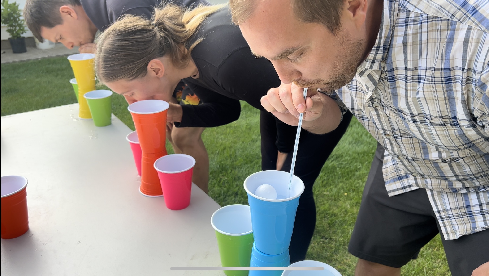 party games involving a straw, a ping pong ball and a cup